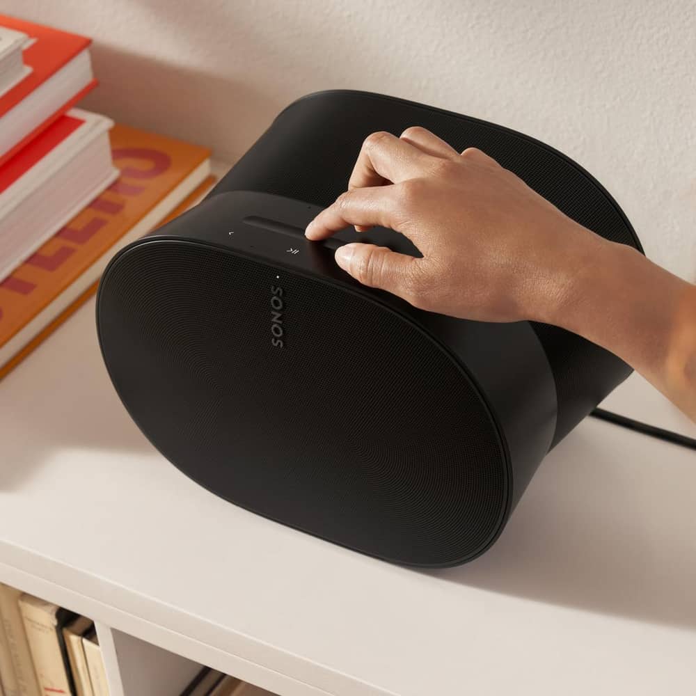 Easy-to-use touch controls on the top of a black Era 300 speaker